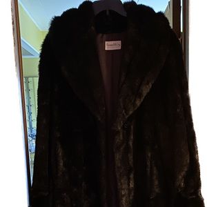 Pamela McCoy long fur coat